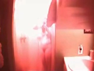 Terrific busty teen caught in the shower on hidden cam