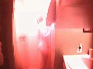 Terrific busty teen caught in the shower on hidden cam