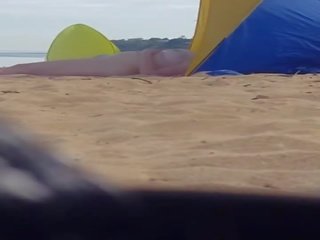 Captivating milf spied at beach (please comment)